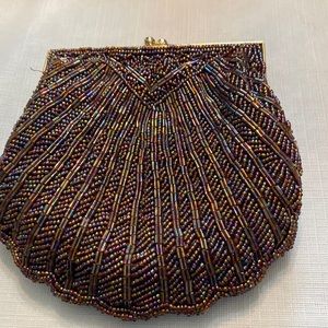 Iridescent handbag with gold metal strap all hand beaded